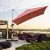 Parasol z podstawą krzyżową i aluminiowym słupkiem 300 x 300 x 261 cm pomarańczowy